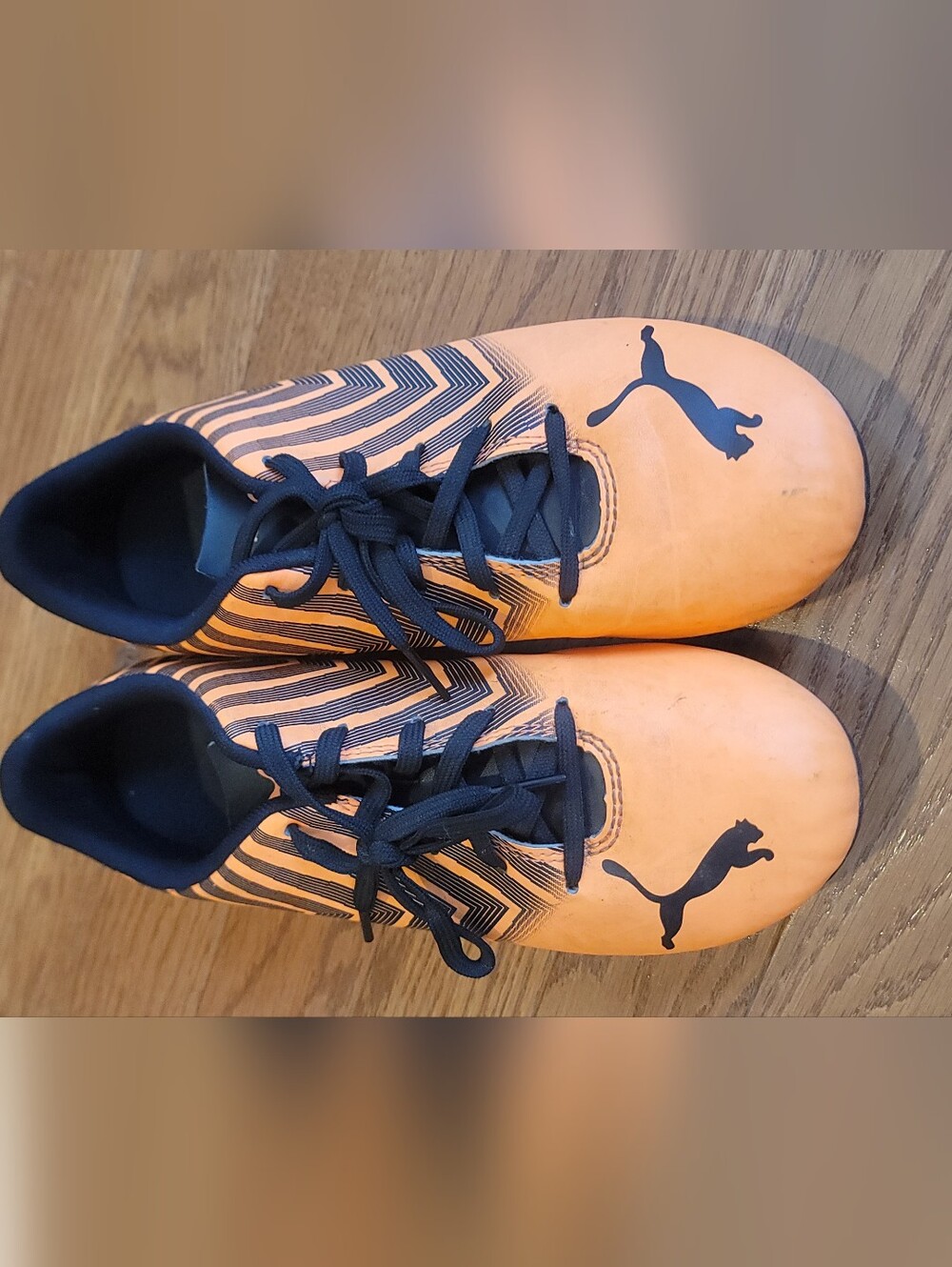 Puma Kids' Orange Soccer Cleats with Black Accents Size 4.5